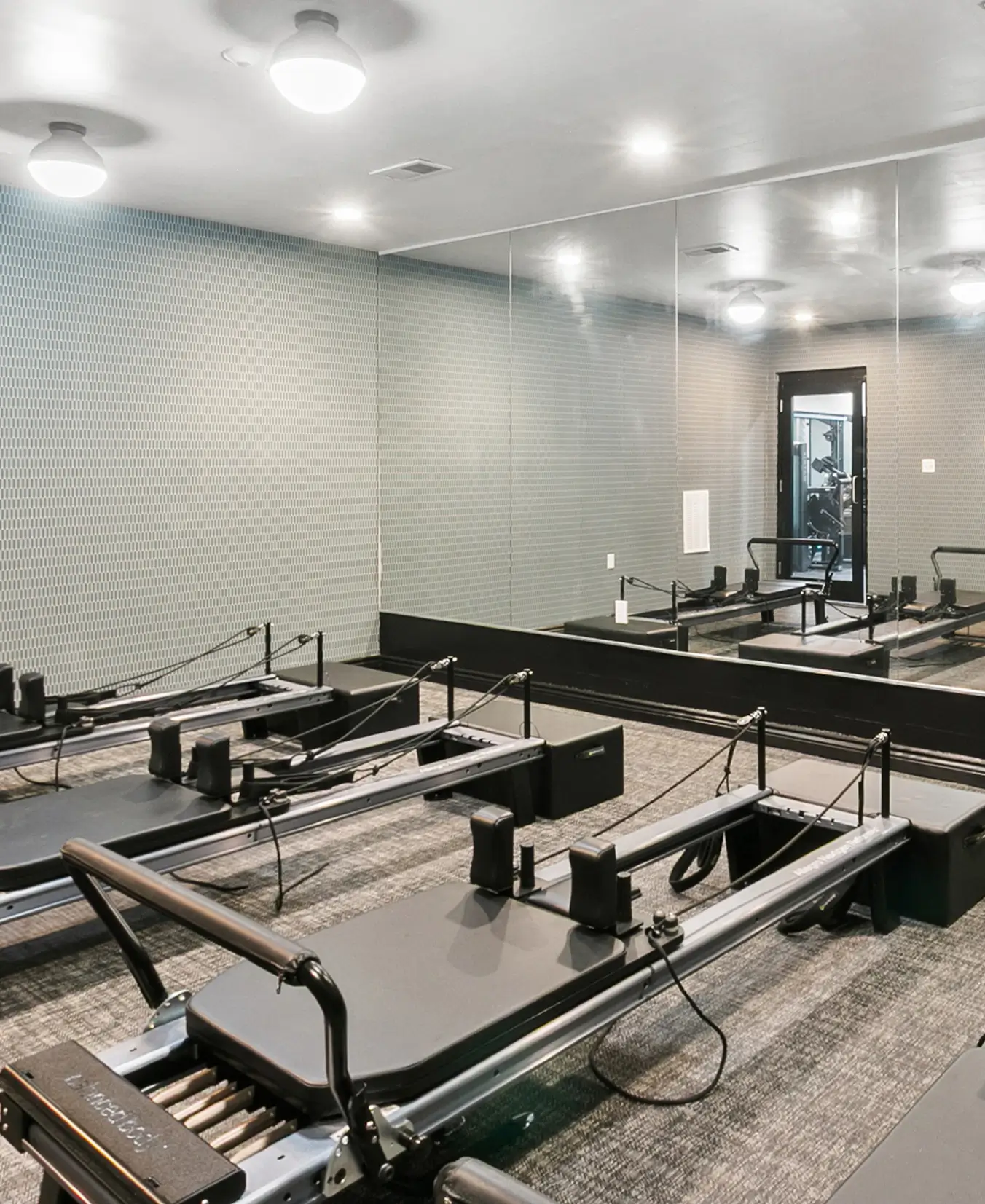 Find what moves you in our 24-hour fitness center featuring Pilates reformers.