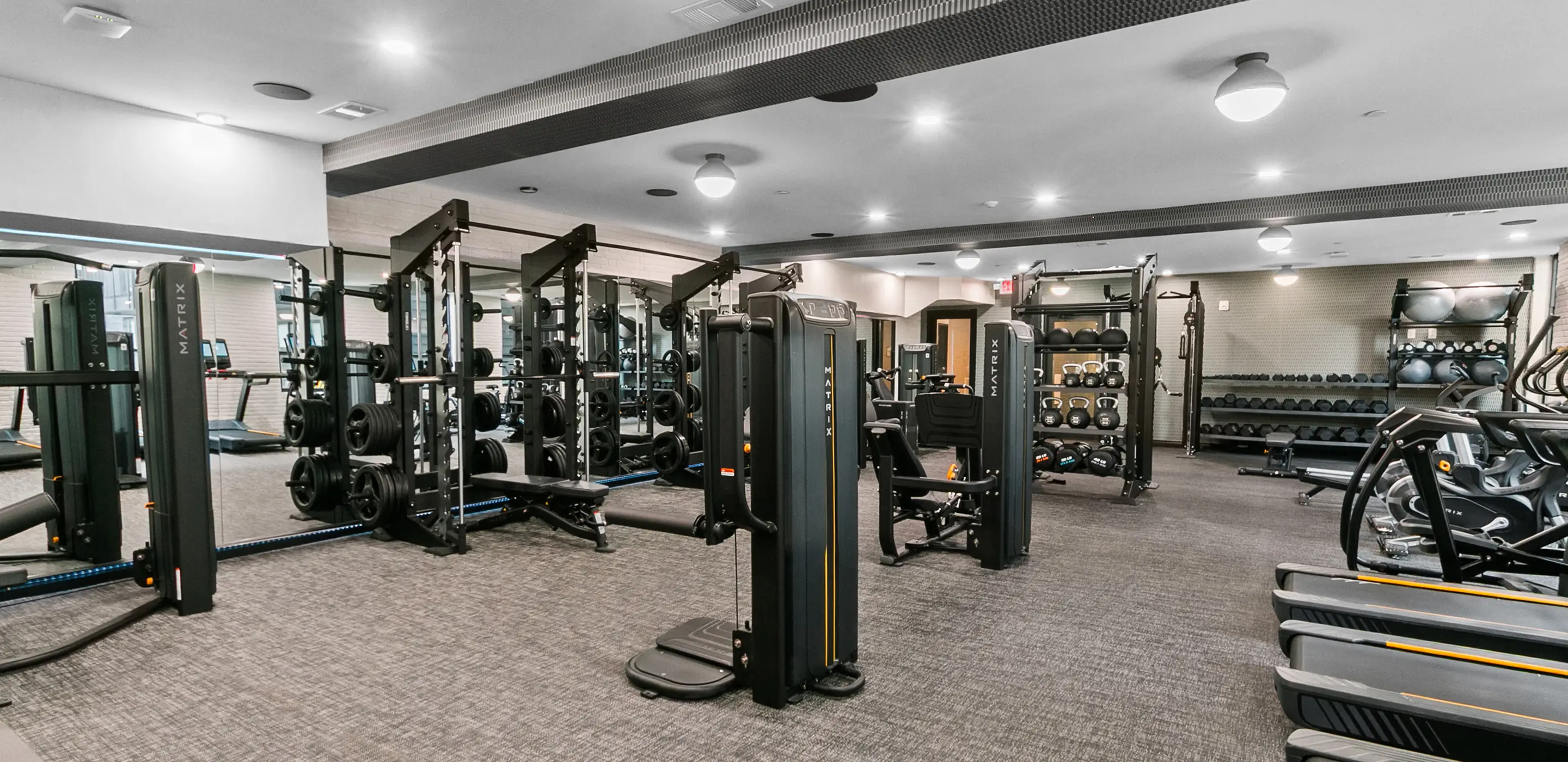24-hour fitness center featuring premier equipment and a spa with yoga studio, steam room & sauna.